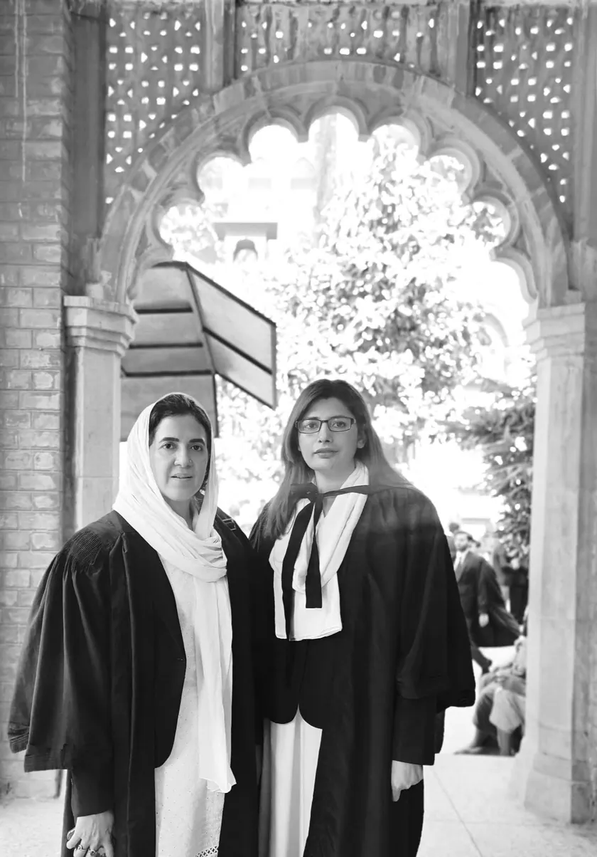 Asma Muzafar Khan with a colleague at the High Court